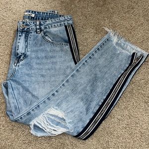 ripped mom jeans with side zipper detail